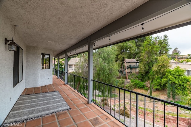 view of patio / terrace with a balcony