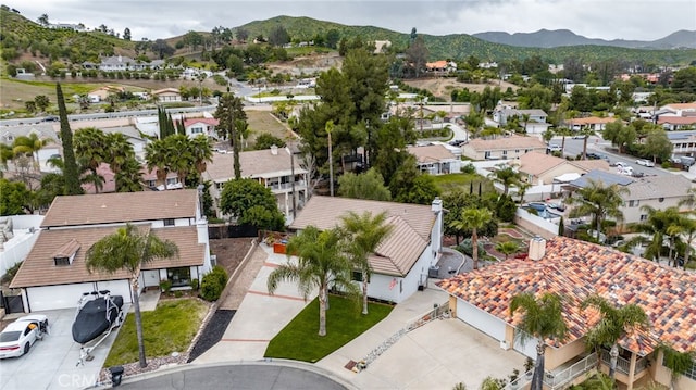 drone / aerial view featuring a mountain view