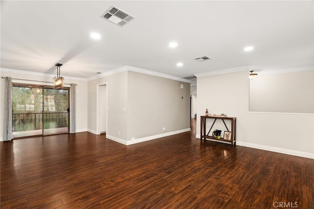 unfurnished living room featuring ornamental molding and dark wood-type flooring