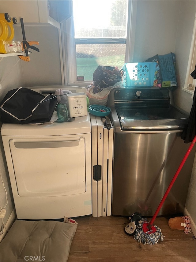 laundry area featuring dark wood-type flooring