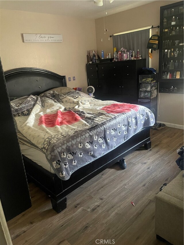 bedroom featuring hardwood / wood-style floors