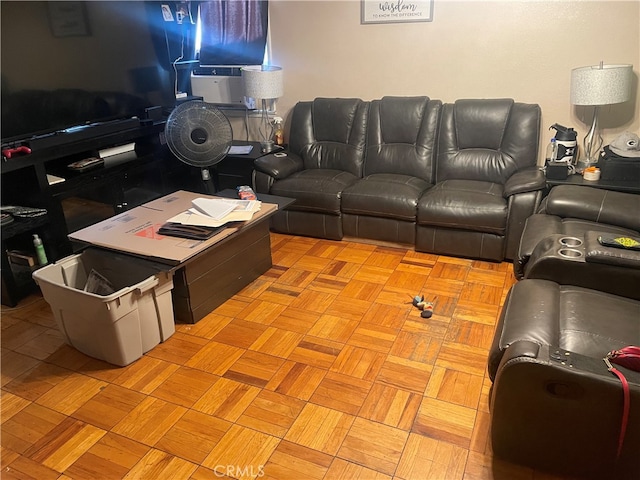 living room featuring light parquet flooring