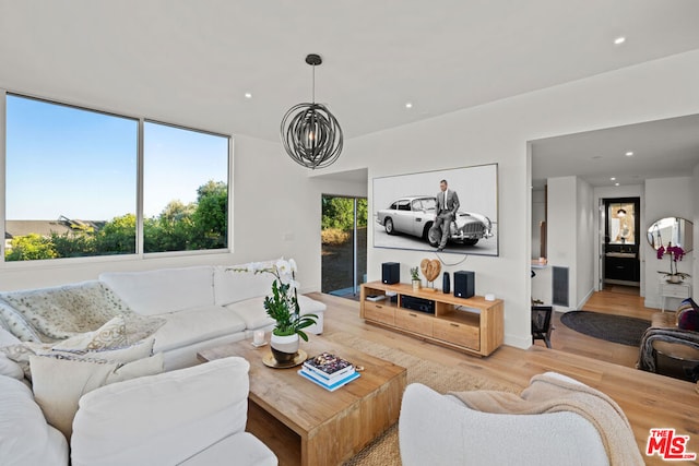 living room with light hardwood / wood-style flooring