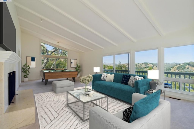 sunroom / solarium featuring vaulted ceiling with beams, a premium fireplace, and billiards