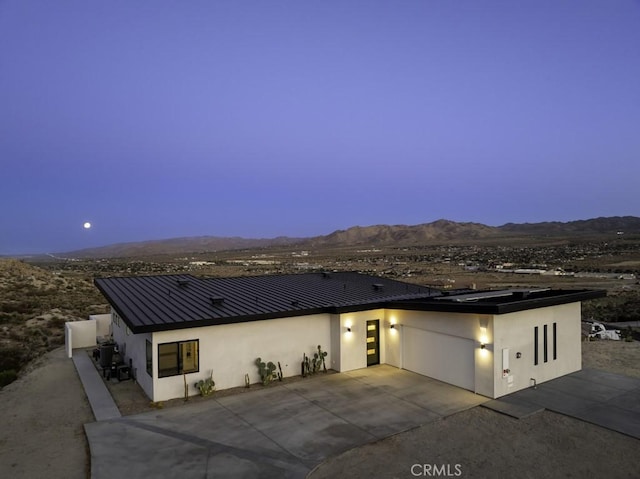 view of front facade with a mountain view