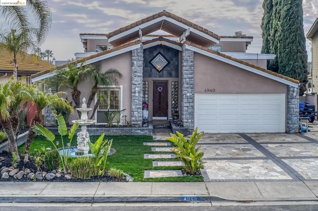 view of front of home featuring a garage