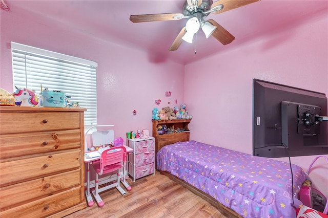 bedroom featuring ceiling fan and hardwood / wood-style floors