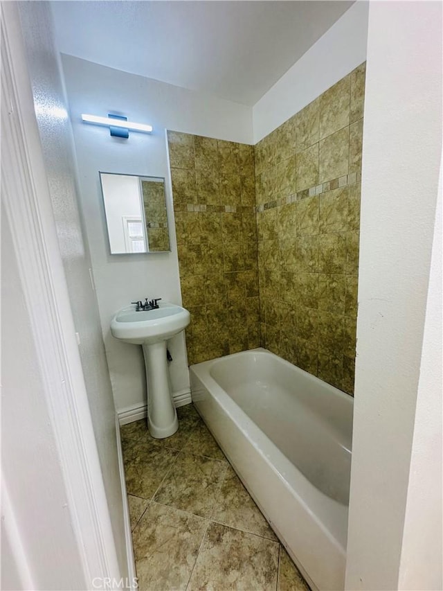 bathroom with tile patterned floors