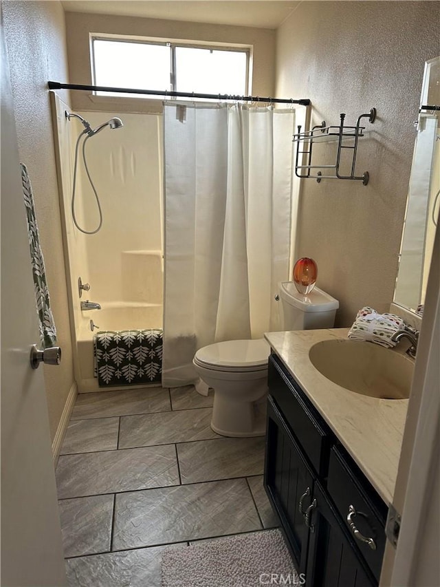 full bathroom with vanity, toilet, and shower / tub combo with curtain