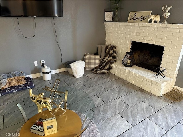 unfurnished living room with a brick fireplace