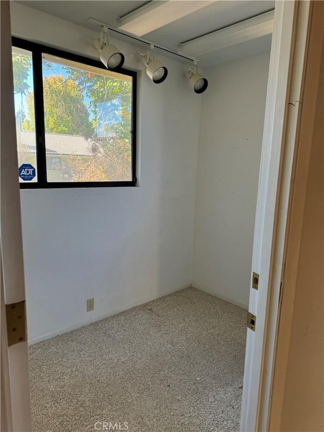 unfurnished dining area with carpet floors