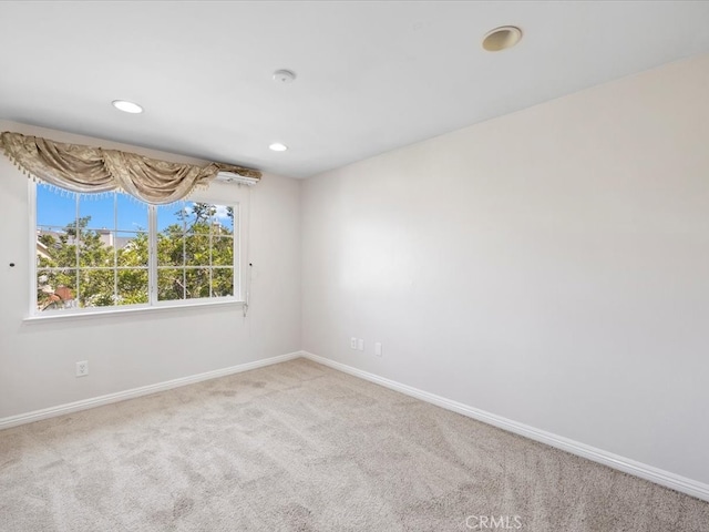 view of carpeted spare room