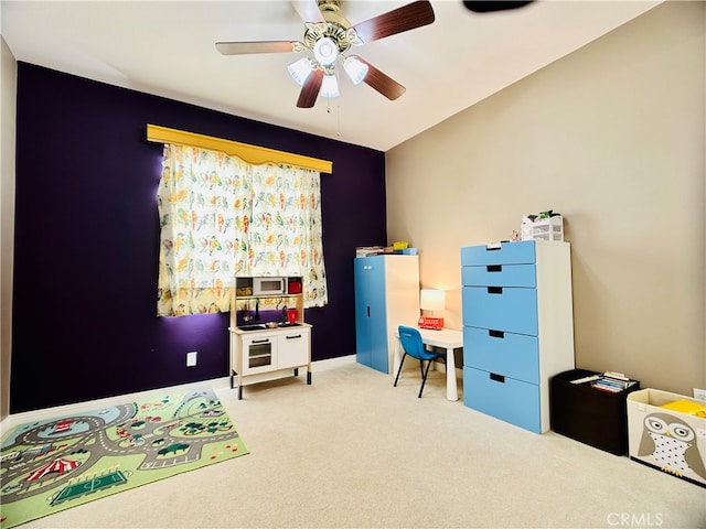 bedroom featuring ceiling fan and carpet floors