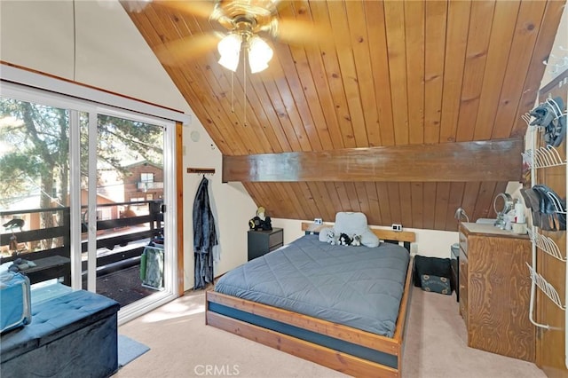 carpeted bedroom featuring lofted ceiling with beams and wooden ceiling