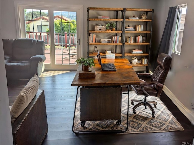 home office featuring dark wood-type flooring