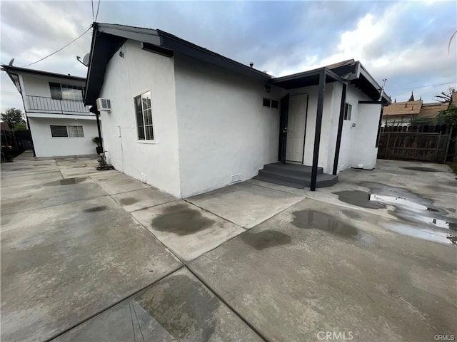 back of property featuring a patio area