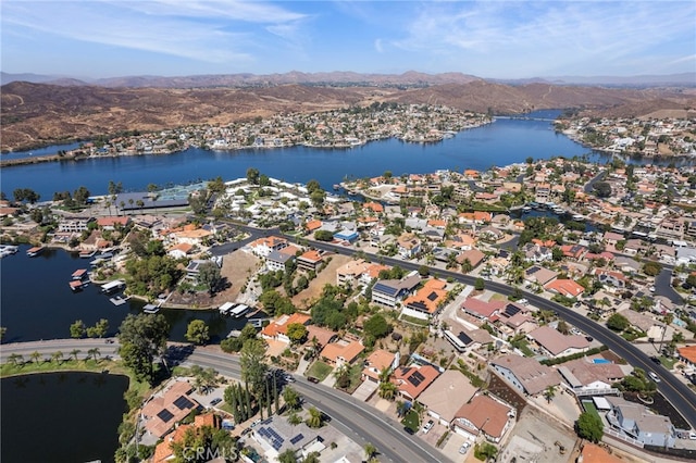 bird's eye view featuring a water and mountain view