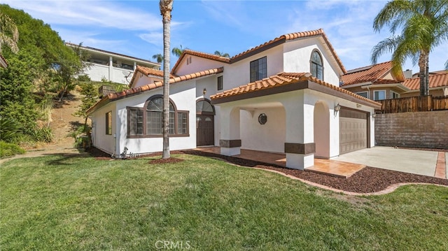 view of front of property featuring a garage and a front yard