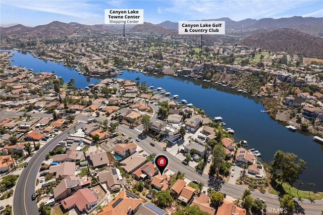 bird's eye view with a water and mountain view