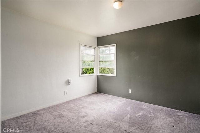 empty room featuring carpet flooring