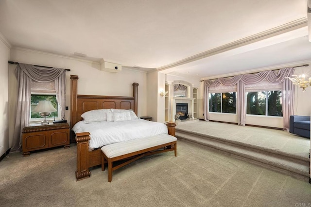 bedroom with carpet floors and crown molding