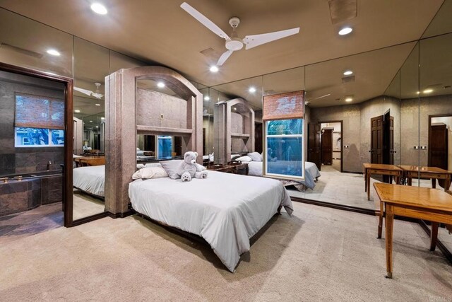 bedroom featuring ceiling fan and light colored carpet