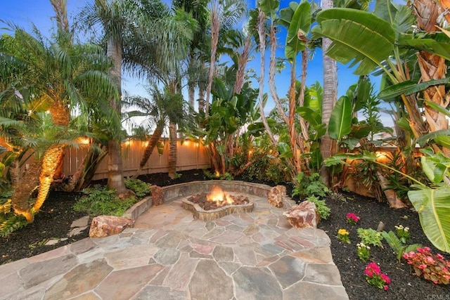 view of patio / terrace with an outdoor fire pit