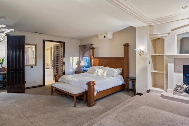 bedroom featuring carpet floors, connected bathroom, ornamental molding, and a fireplace