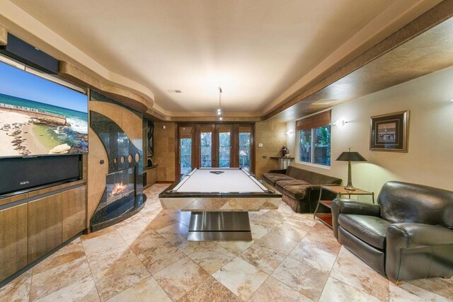 recreation room with pool table and french doors