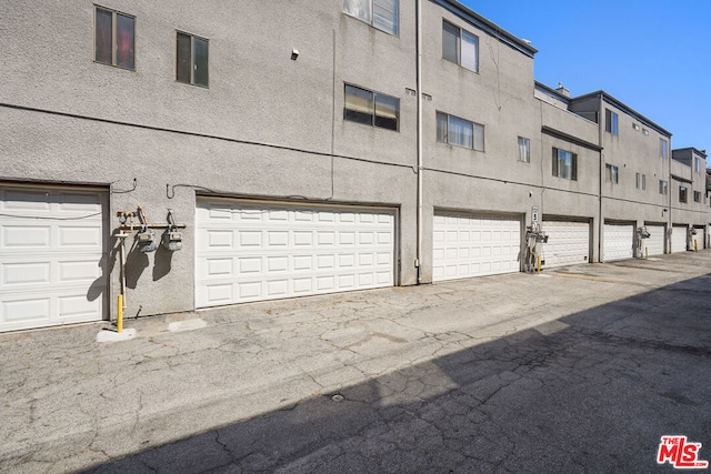 exterior space featuring a garage