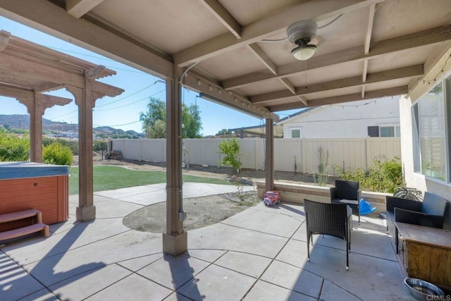 view of patio with a hot tub