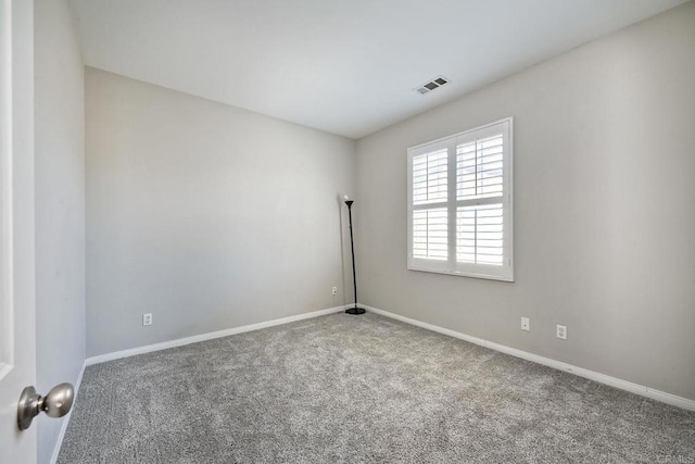 spare room with carpet flooring