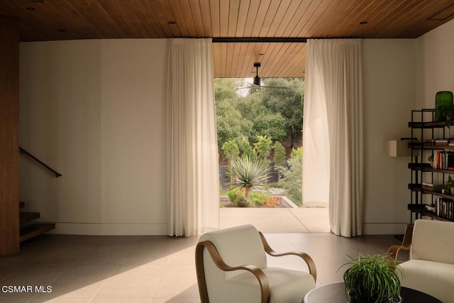 sitting room featuring wooden ceiling