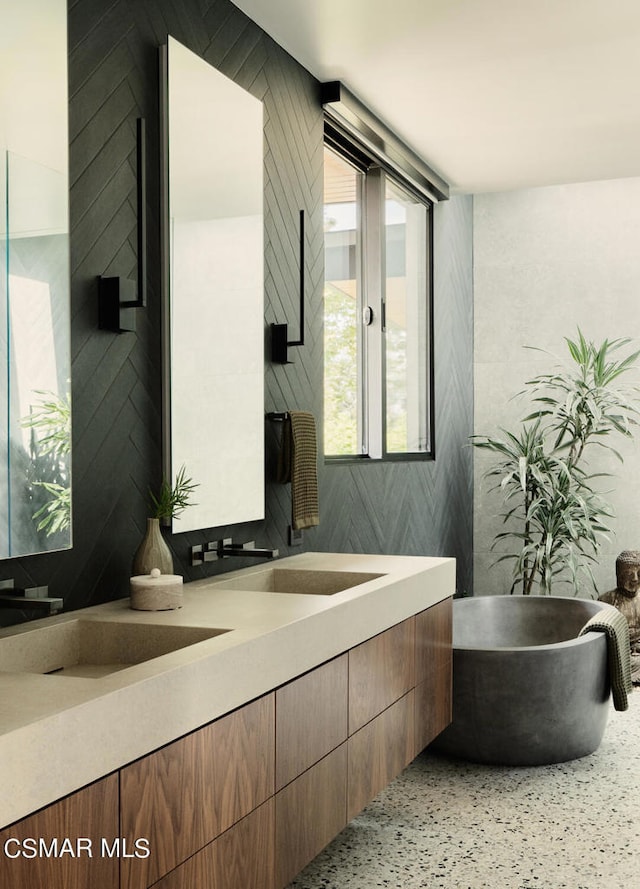 bathroom featuring a bathtub and vanity