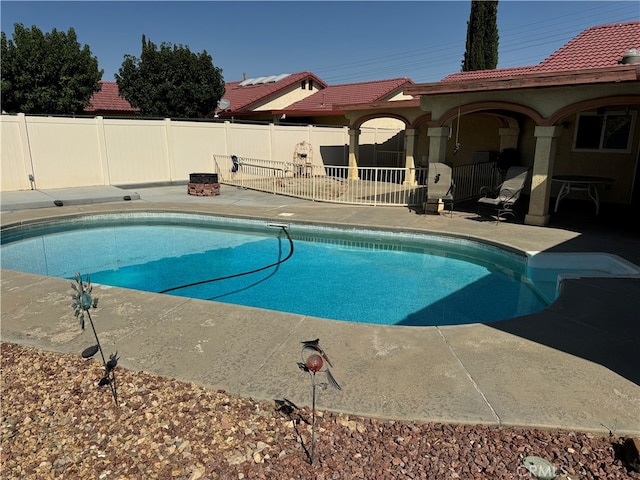 view of pool featuring a patio area