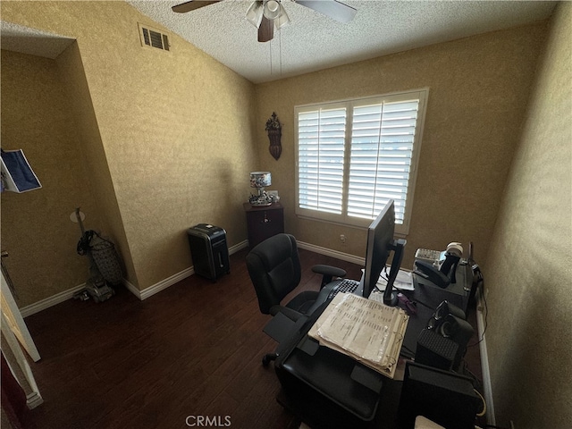 home office featuring a textured ceiling, ceiling fan, and dark hardwood / wood-style flooring