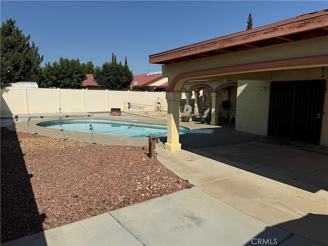 view of pool with a patio