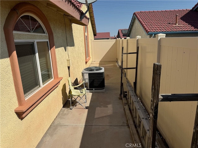 view of patio / terrace with central AC unit