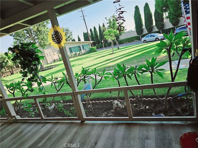 view of gate featuring a yard