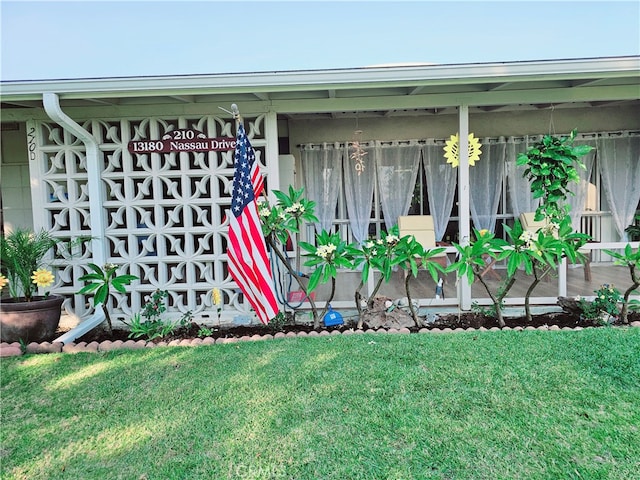 exterior space featuring a lawn