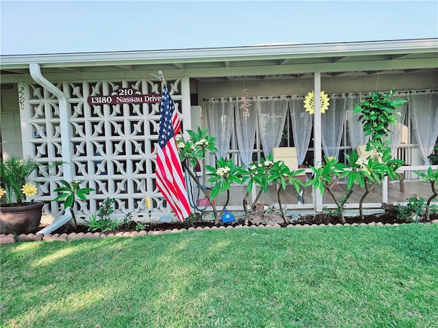 exterior space featuring a yard