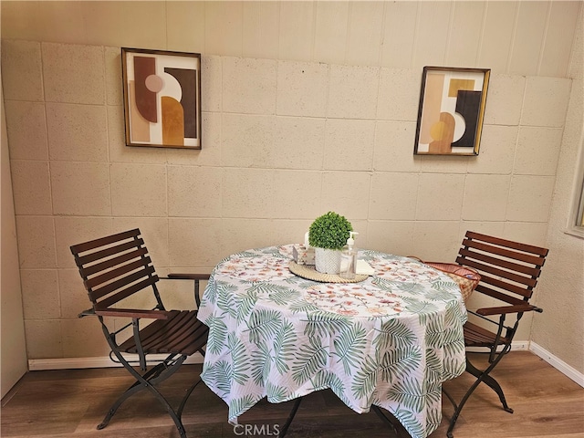 dining room with hardwood / wood-style flooring