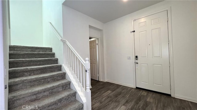 foyer entrance featuring dark hardwood / wood-style flooring