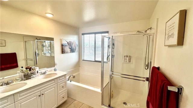 bathroom with vanity and independent shower and bath