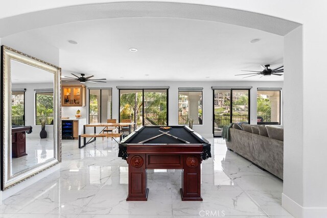 game room with billiards and a healthy amount of sunlight