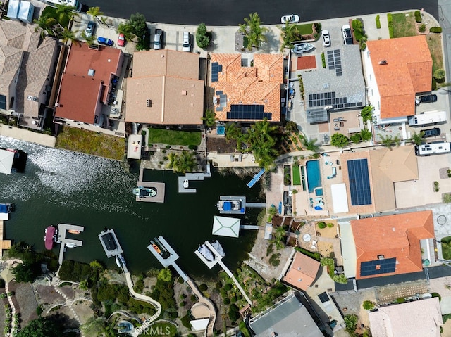 bird's eye view with a water view