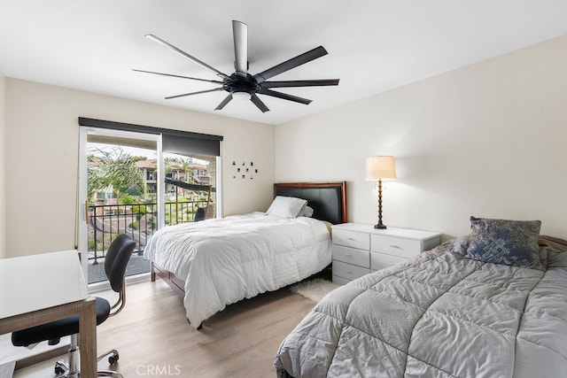 bedroom featuring light wood-type flooring, ceiling fan, and access to exterior