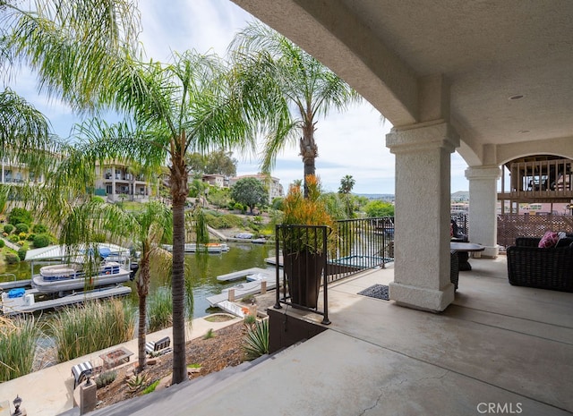 view of patio / terrace featuring a water view