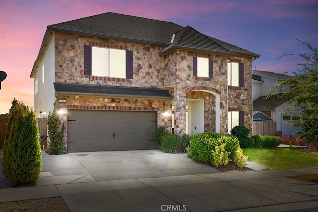 view of front of home with a garage