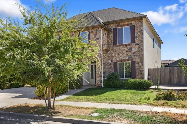 view of front of house with a front lawn